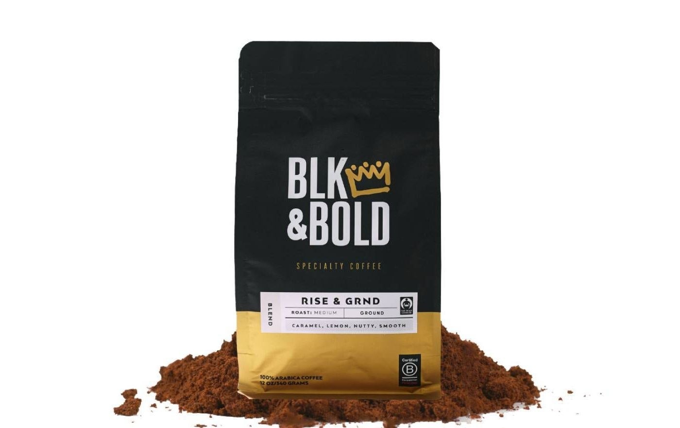 A bag of Blk &amp;amp; Bold&#x27;s &quot;Rise &amp;amp; Grnd&quot; coffee with grounds at the bottom