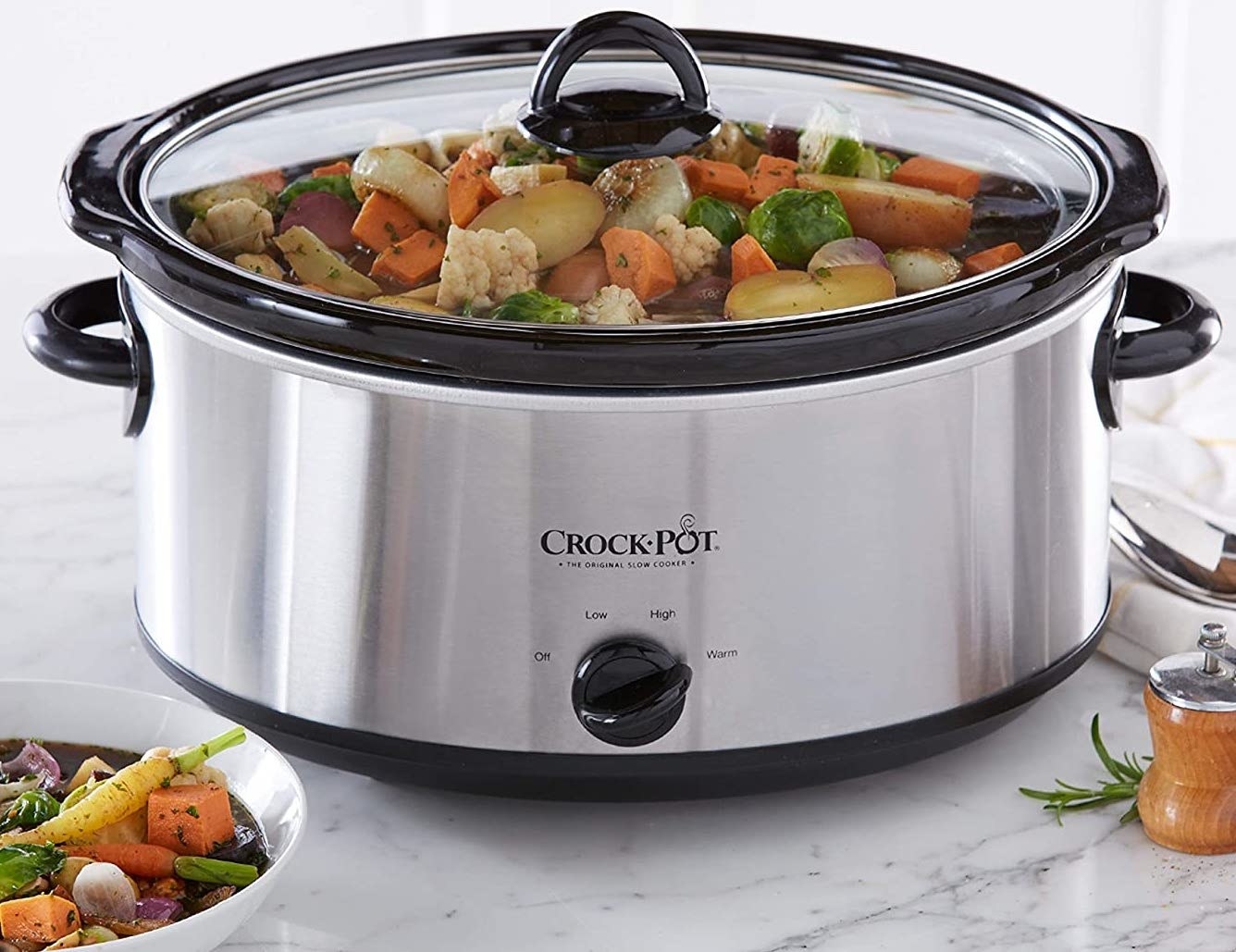The Crock-Pot slow cooker filled with cooked vegetables