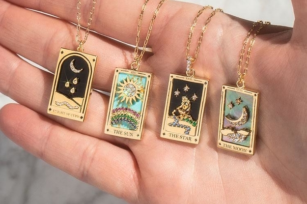 four tarot card-inspired necklaces