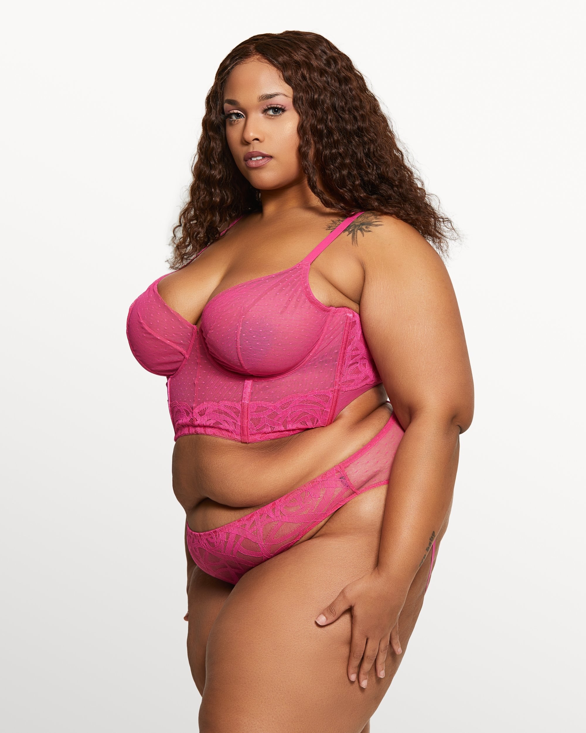 model in sheer pink bustier bra