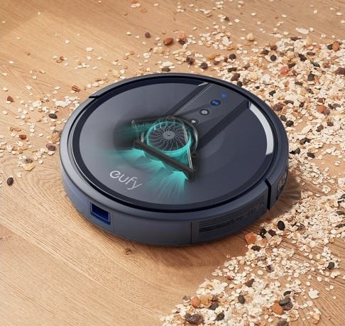 the vacuum picking up spilled food