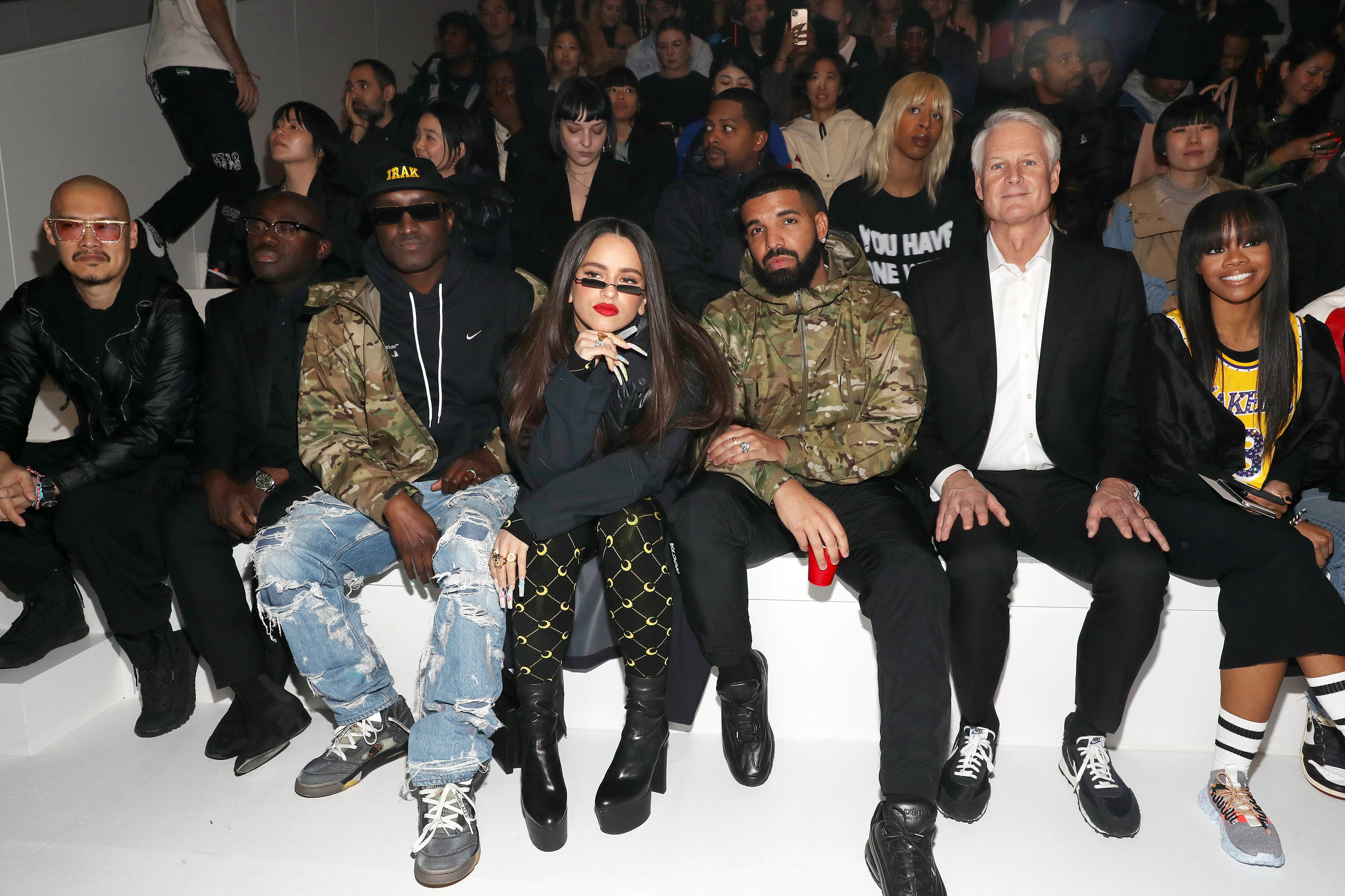 Edward Enninful, Virgil Abloh, Rosalia, Drake, John Donahoe, and Gabby Douglas attend the 2020 Tokyo Olympic collection fashion show at the Shed on Feb. 5, 2020, in New York City.