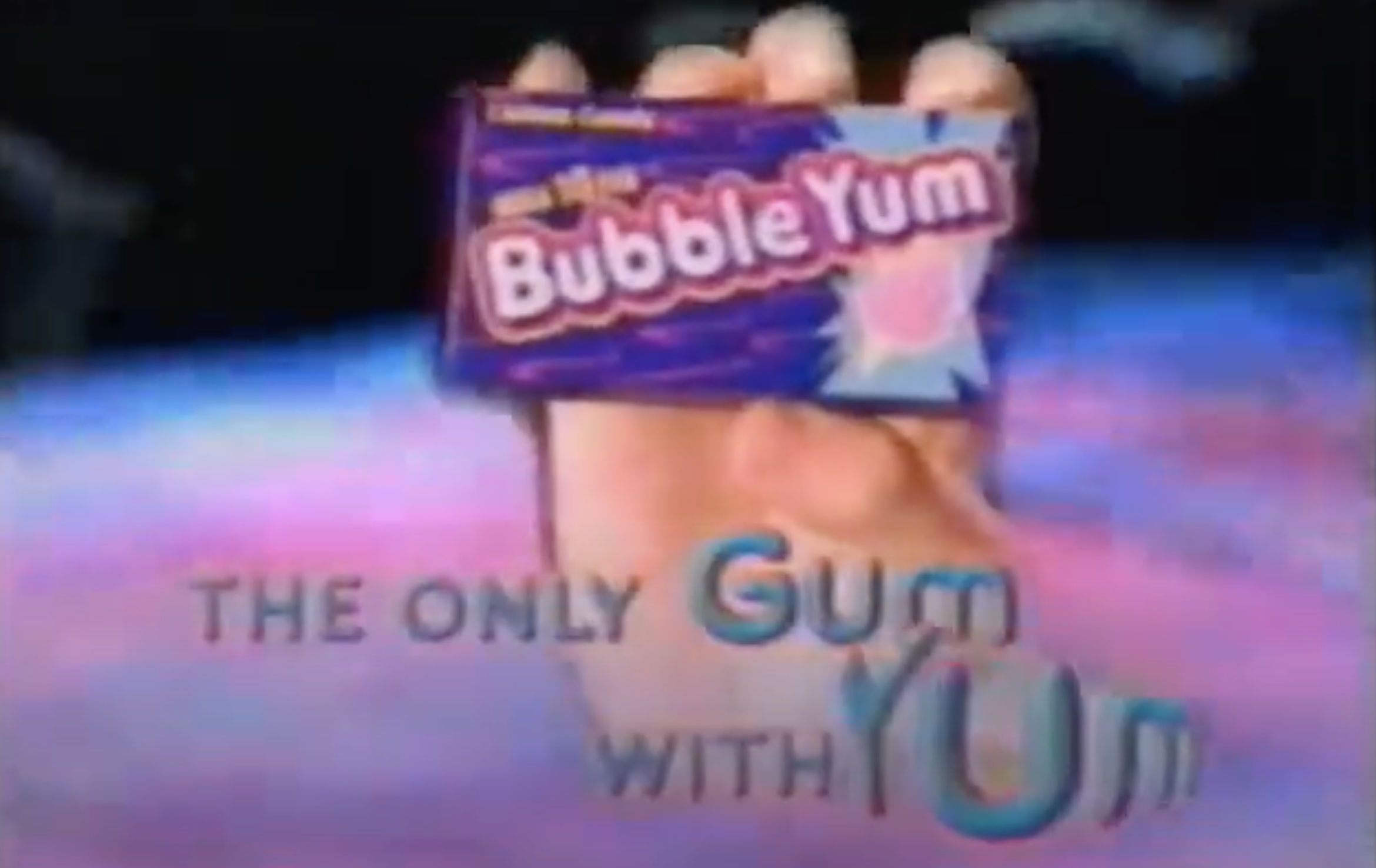 Screenshot of Bubble Yum commercial with pack of gum and text: &quot;the only gum with yum&quot;