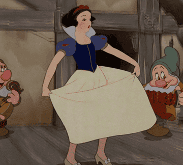 Snow White and the dwarves dancing