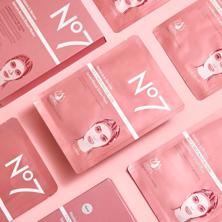 pink packages of Restore &amp; Renew Face &amp; Neck Sheet Masks