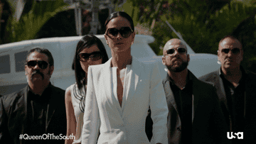 GIF people walking from helicopter