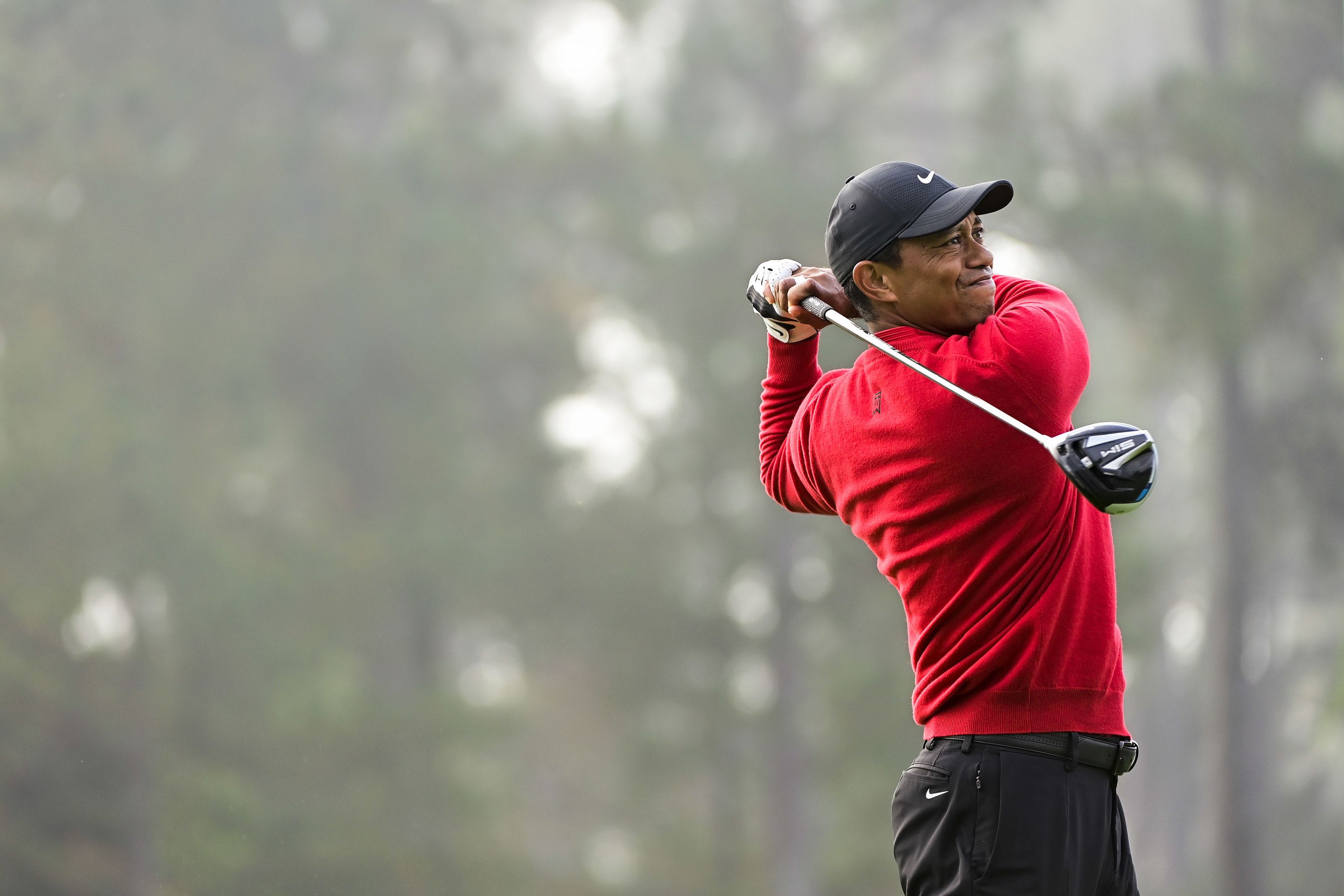 Masters champion Tiger Woods plays his stroke from the No. 1 tee during Round 4 of the Masters at Augusta National Golf Club, Sunday, November 15, 2020. (Photo by Augusta National via Getty Images)