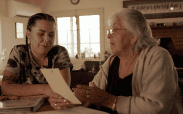 GIF of Aiyanna and her grandmother reading