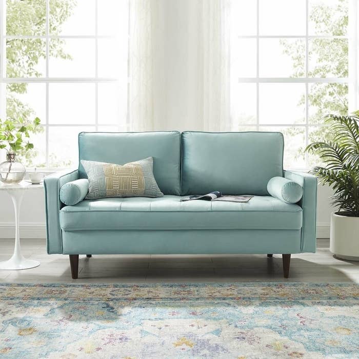 Loveseat shown in a living room