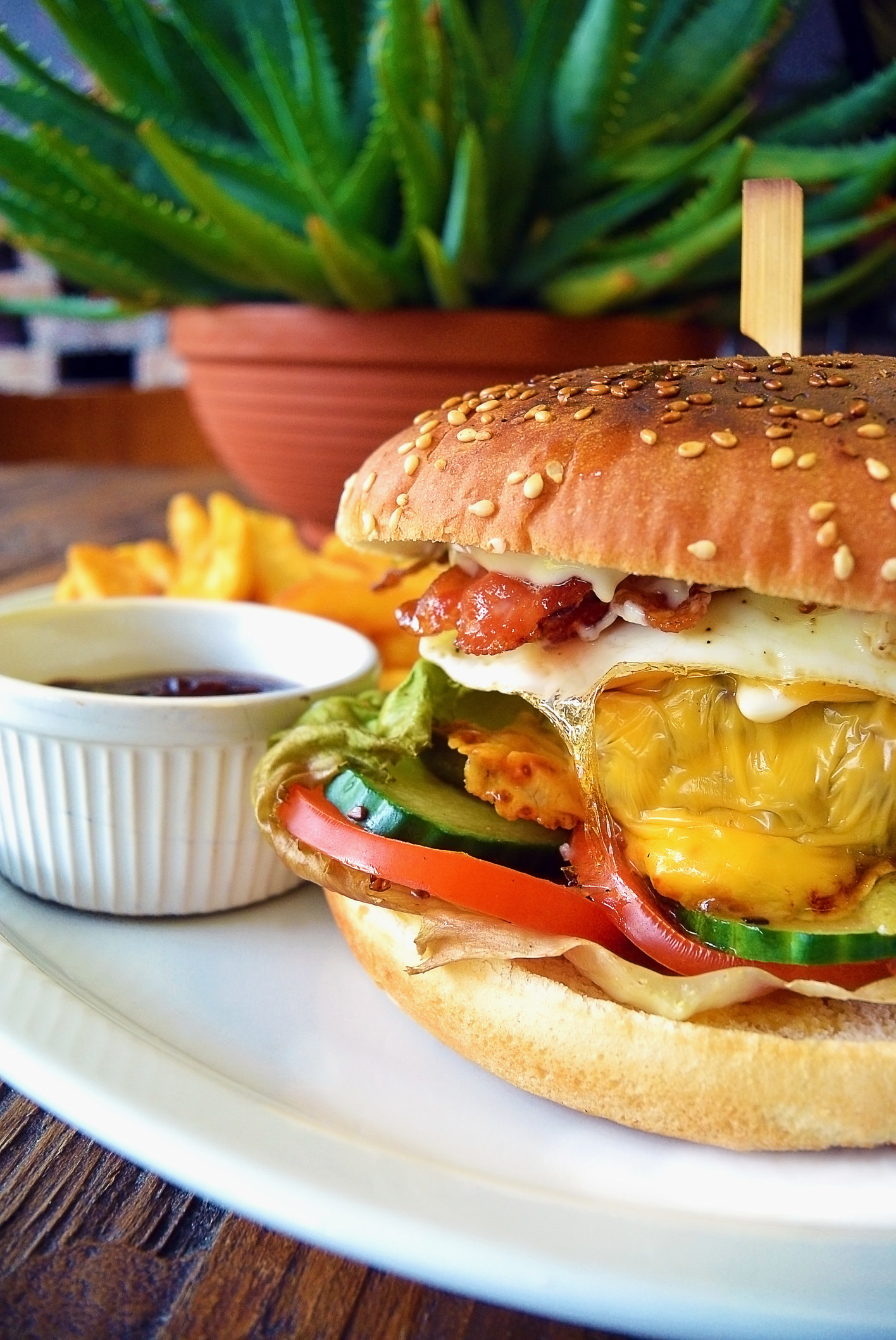 A hamburger with lots of toppings.