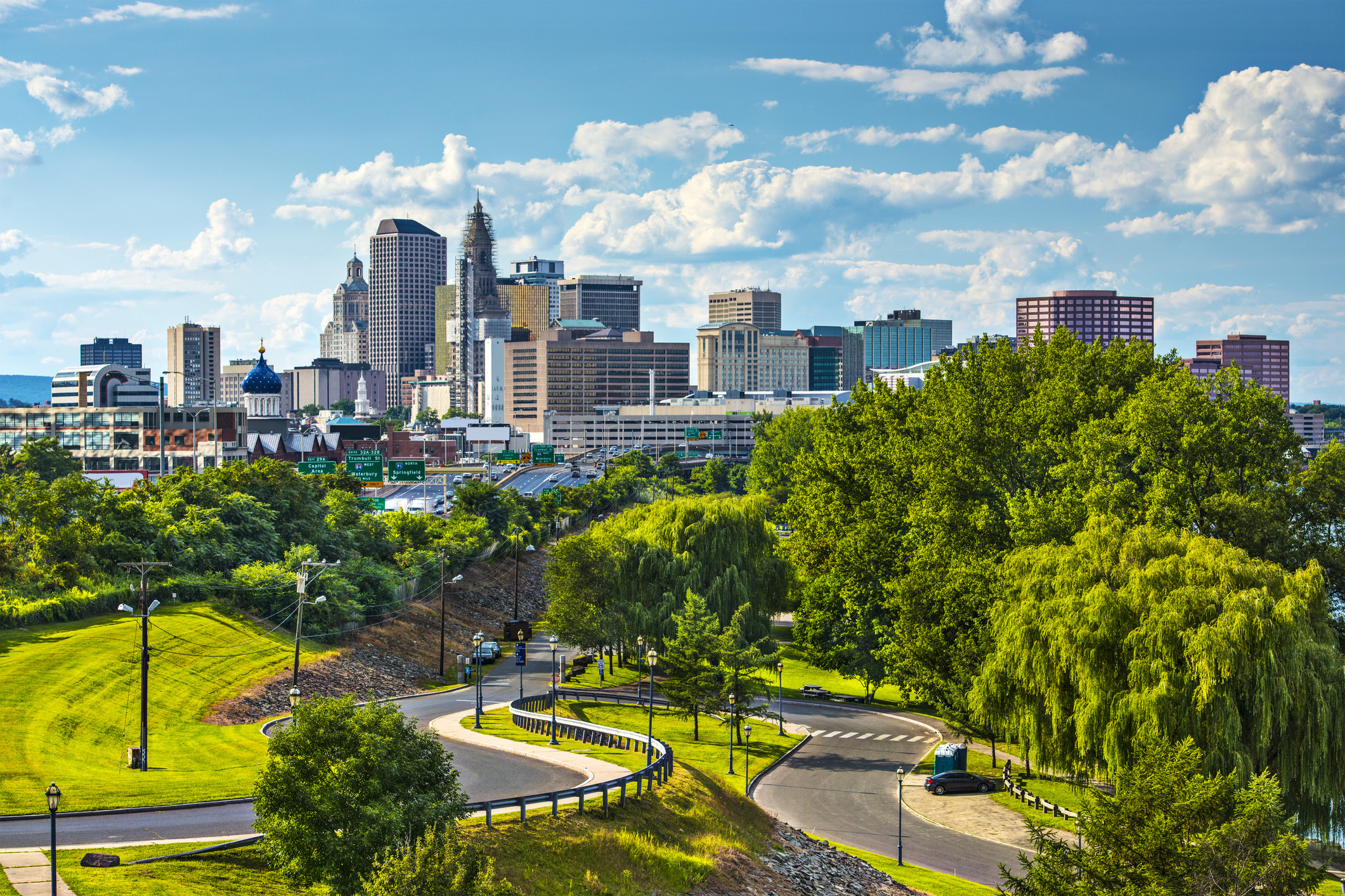 shot of Hartford&#x27;s downtown area and its lush trees and winding roads