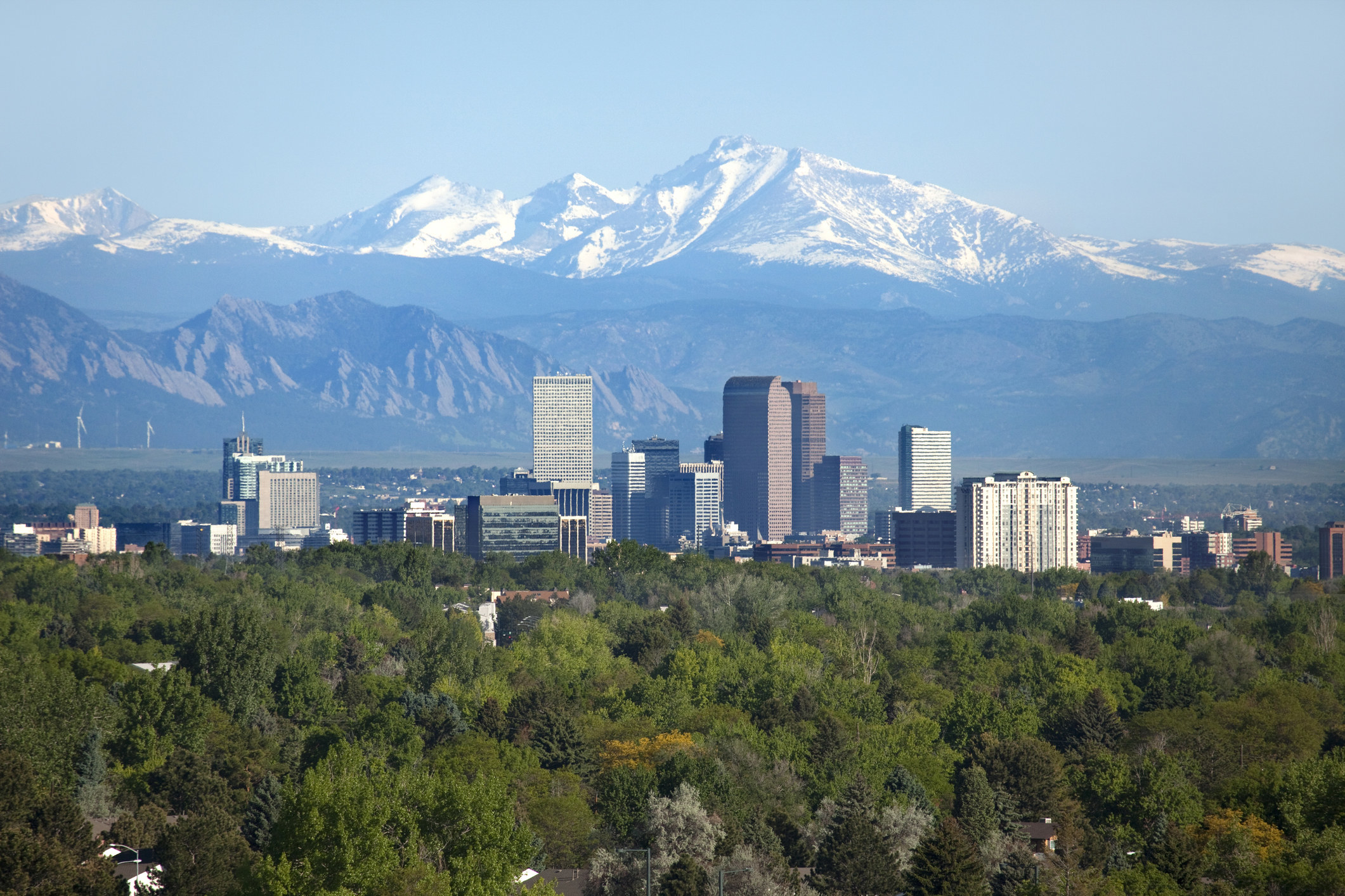 shot of Denver&#x27;s downtown set against a backdrop of mountains
