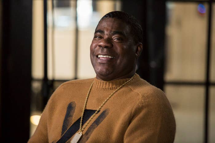 Tracy Morgan smiles on SUNDAY TODAY WITH WILLIE GEIST while wearing a sweater