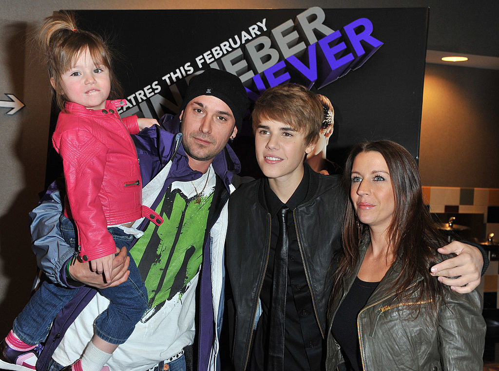 Justin Bieber and his step sister, dad, and mom