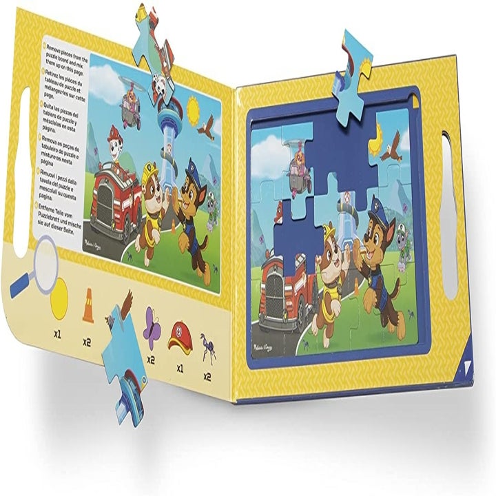 The book folded out to show the puzzles