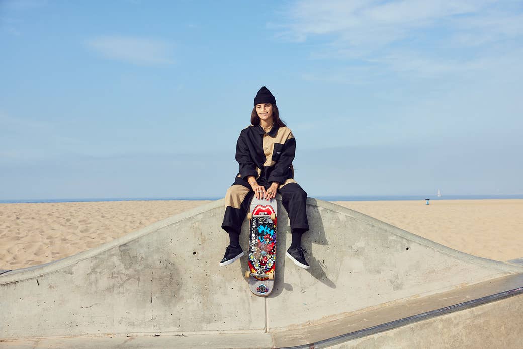 Skater and influencer Brooklinn Khoury on a ridge at the skate park with the beach and horizon behind her