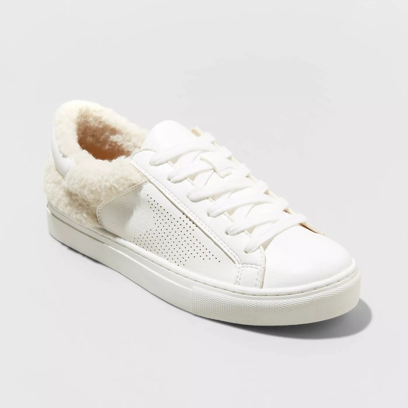 The white sneaker with white laces, and star detail