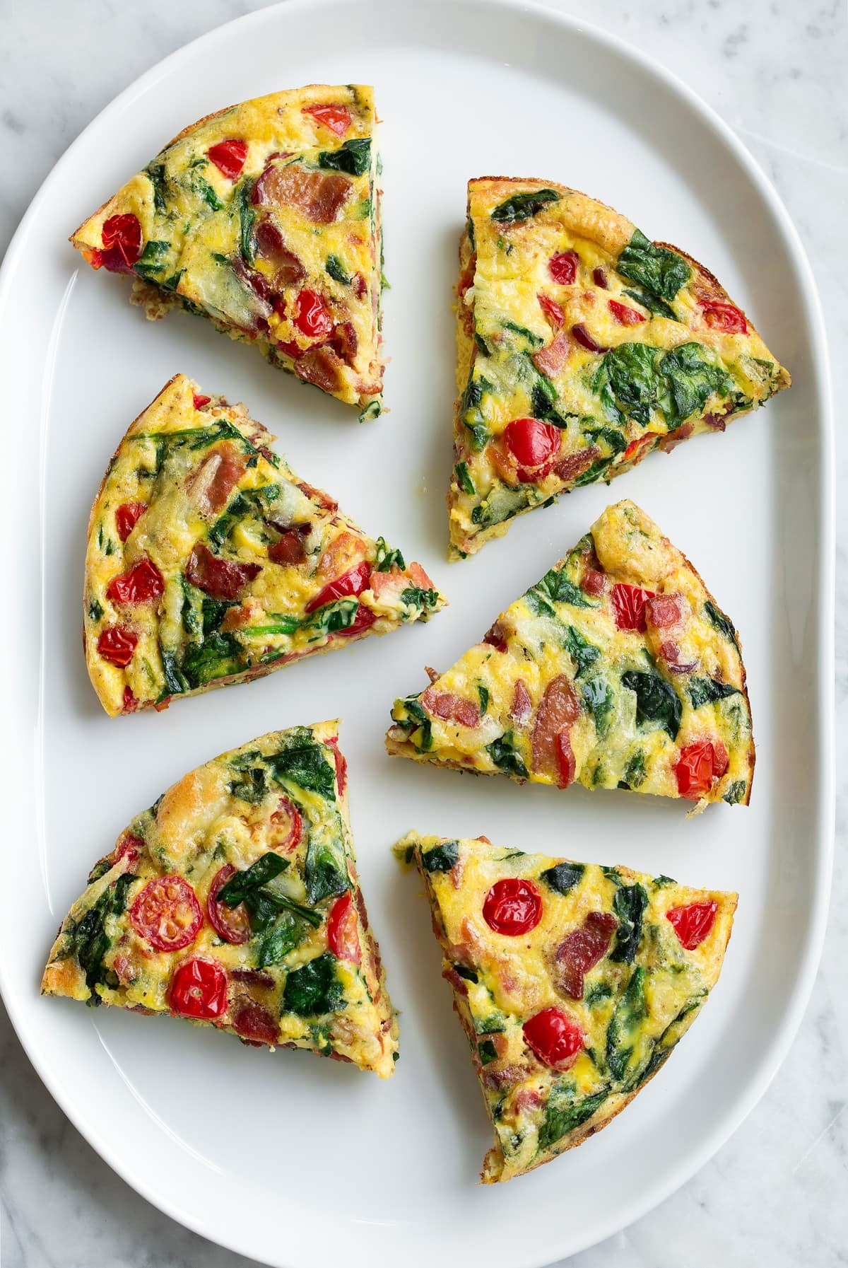 Pieces of frittata on a plate.