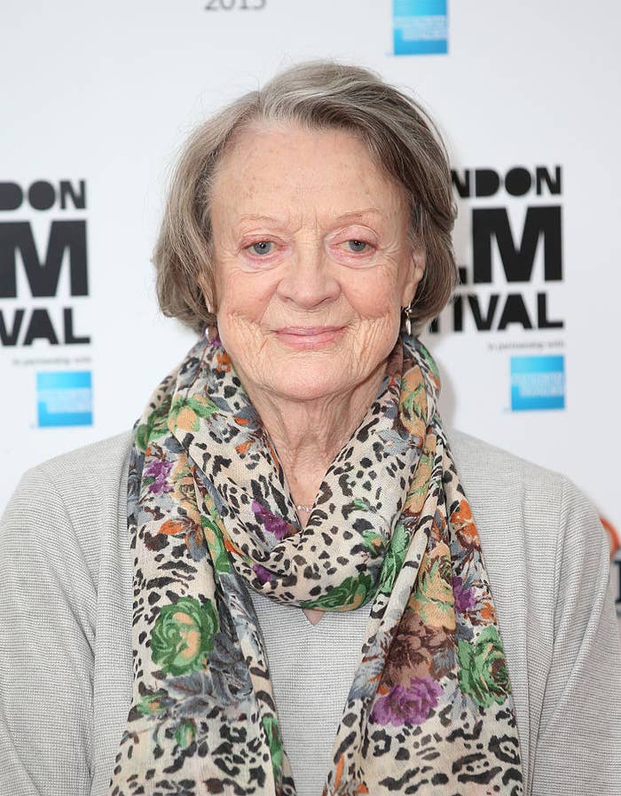 Maggie Smith wearing a colorful neck scarf