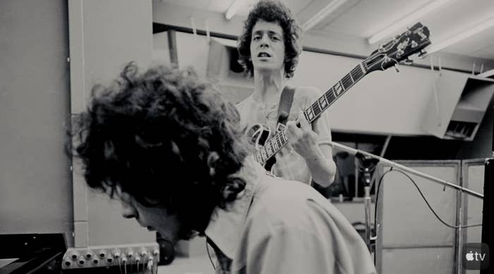 Lou Reed playing guitar.