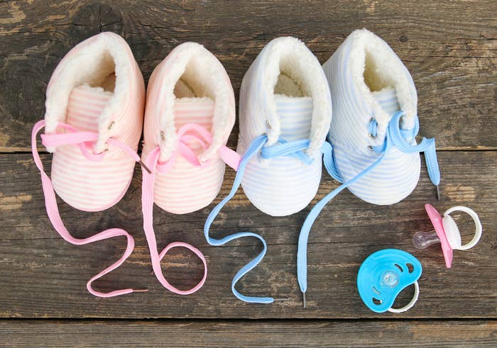 The laces of baby shoes are arranged to sat 2021