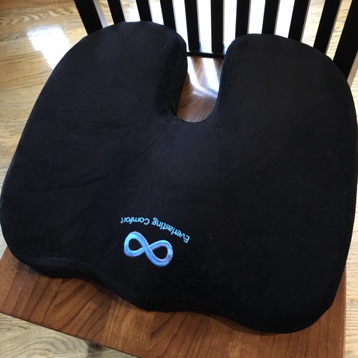 A customer review photo of the cushion on their wooden chair