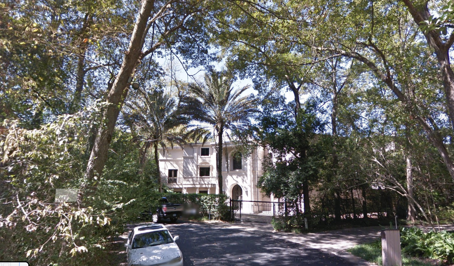 A streetside view of the Houston mansion