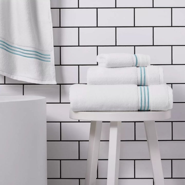 The towels in the color Aqua Stripe
