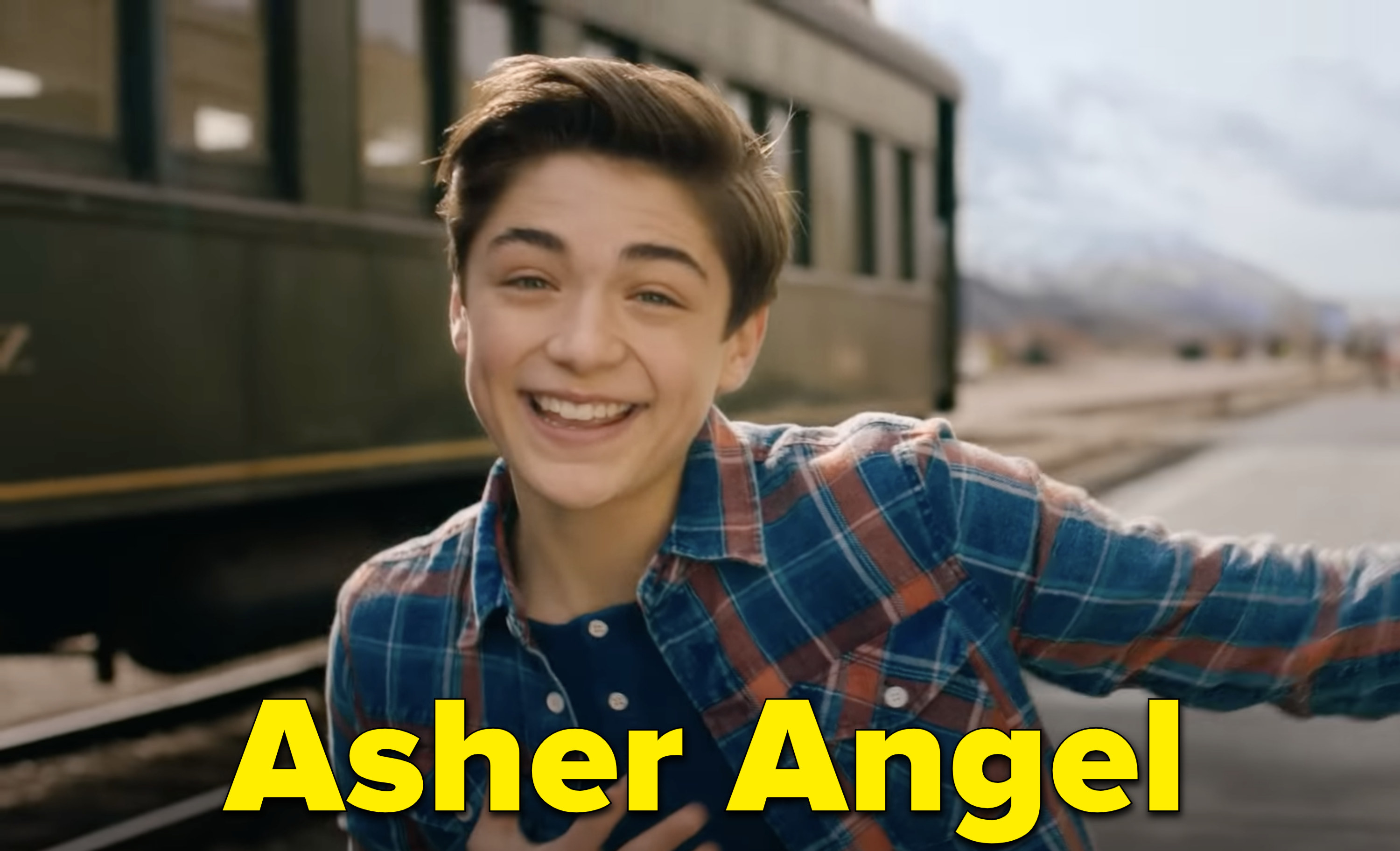 Asher Angel in a music video