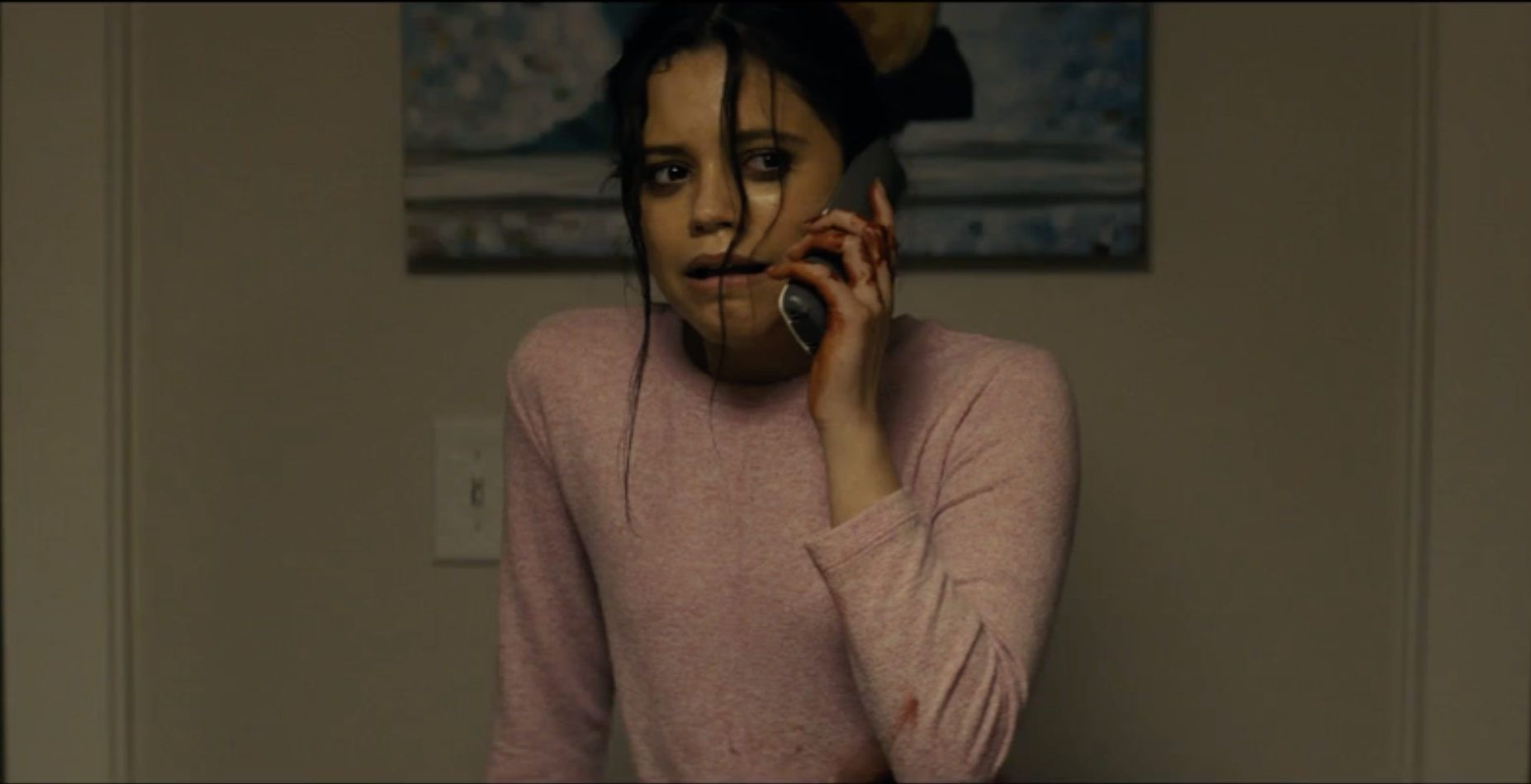 A terrified teen girl on the phone