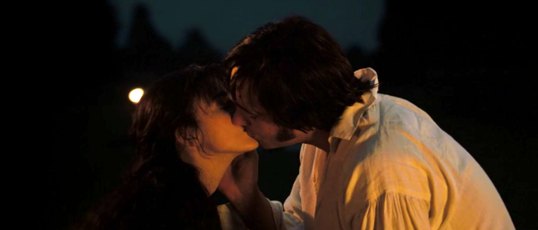 Elizabeth and Darcy kissing by the lake at night