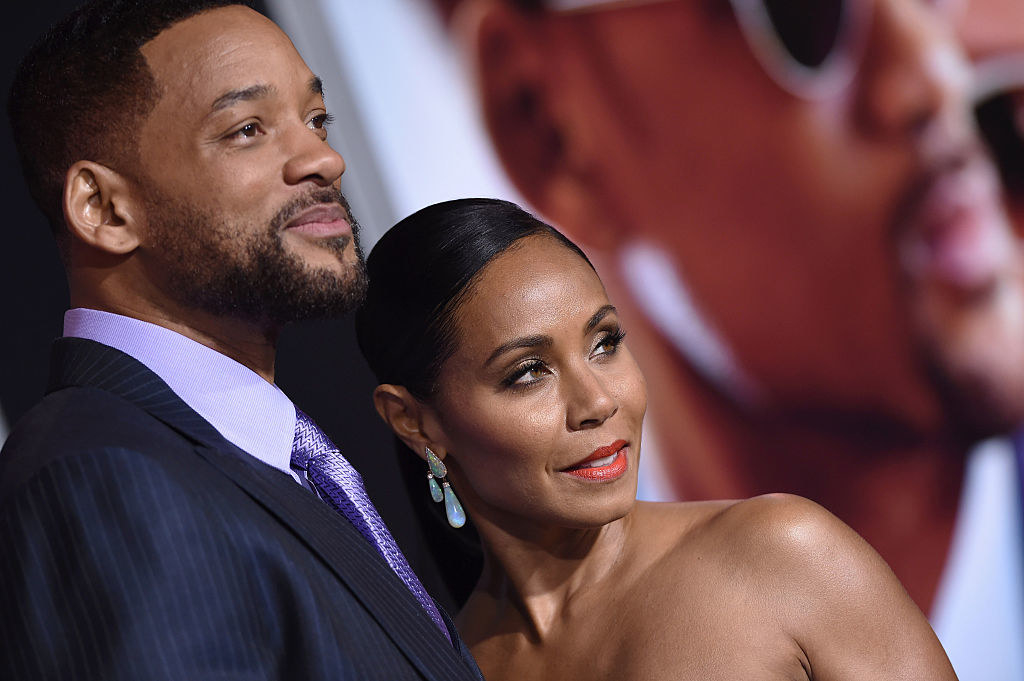 Will and Jada pose for photographers on a red carpet