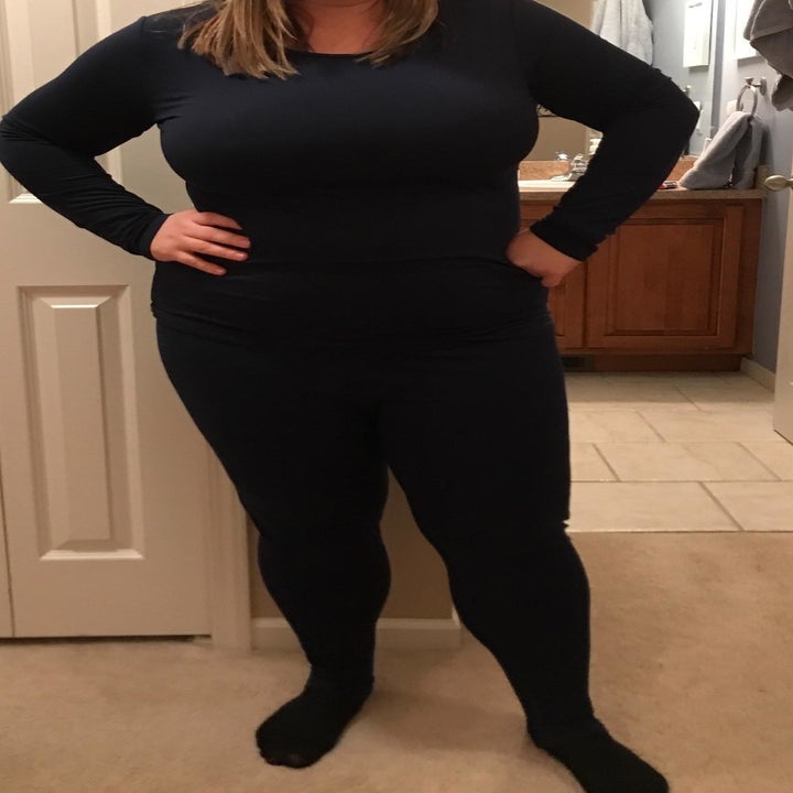 reviewer wearing black set