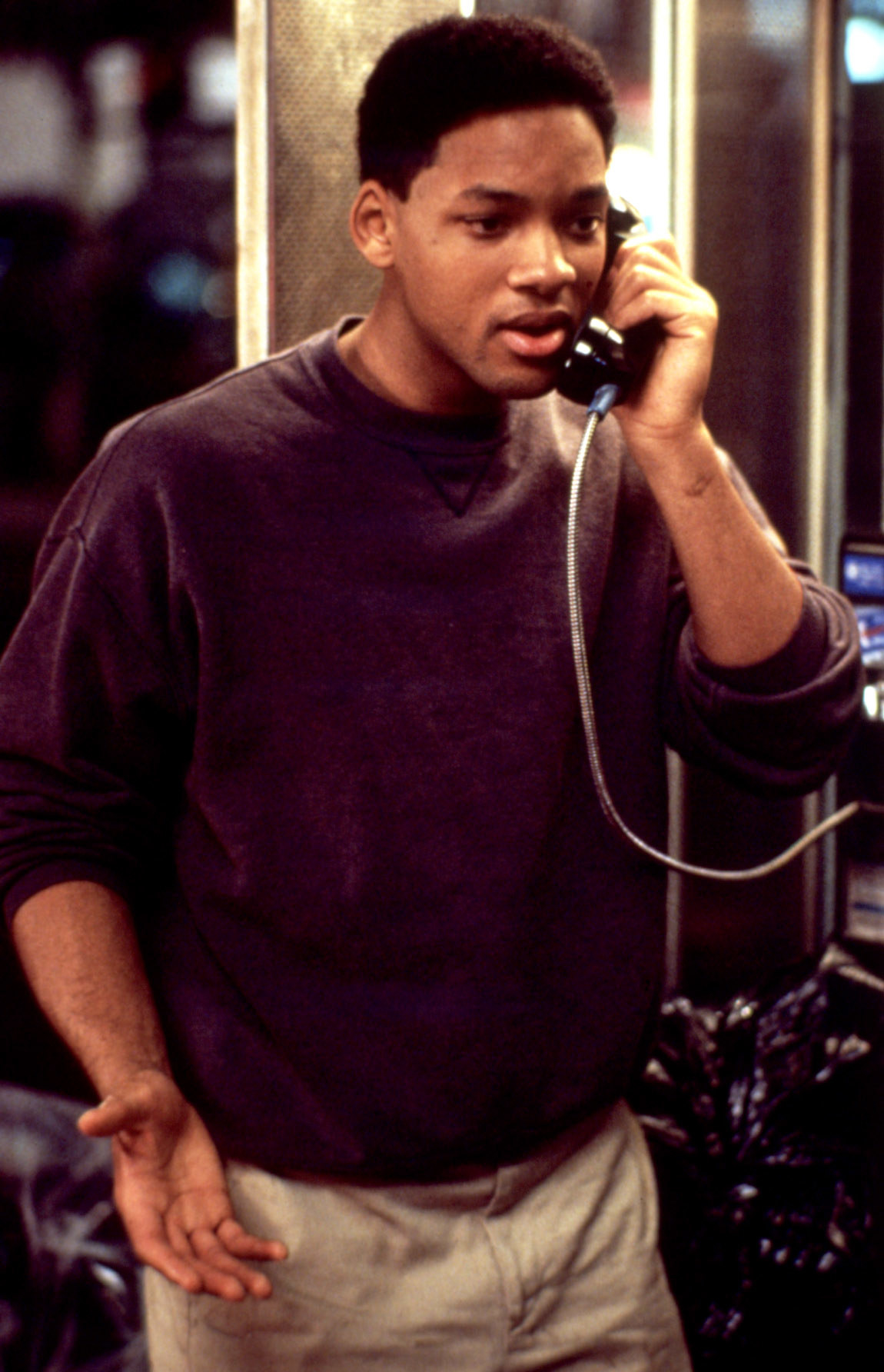 A young Will speaking on a payphone in a scene from Six Degrees of Separation