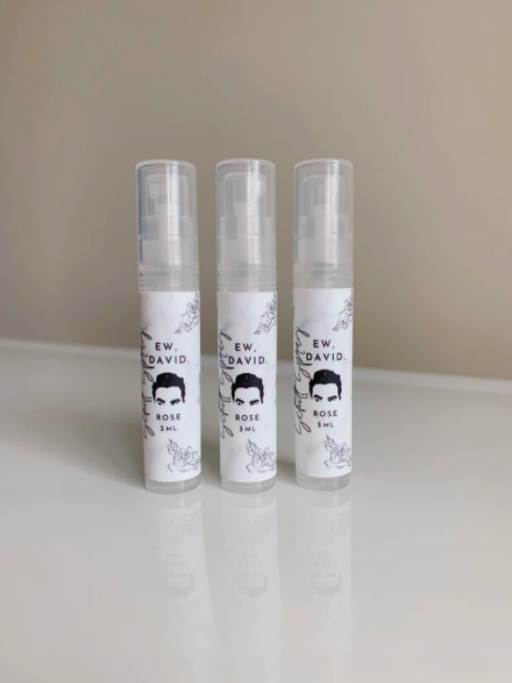 three travel size bottles with david&#x27;s face and &quot;ew, david&quot; on them