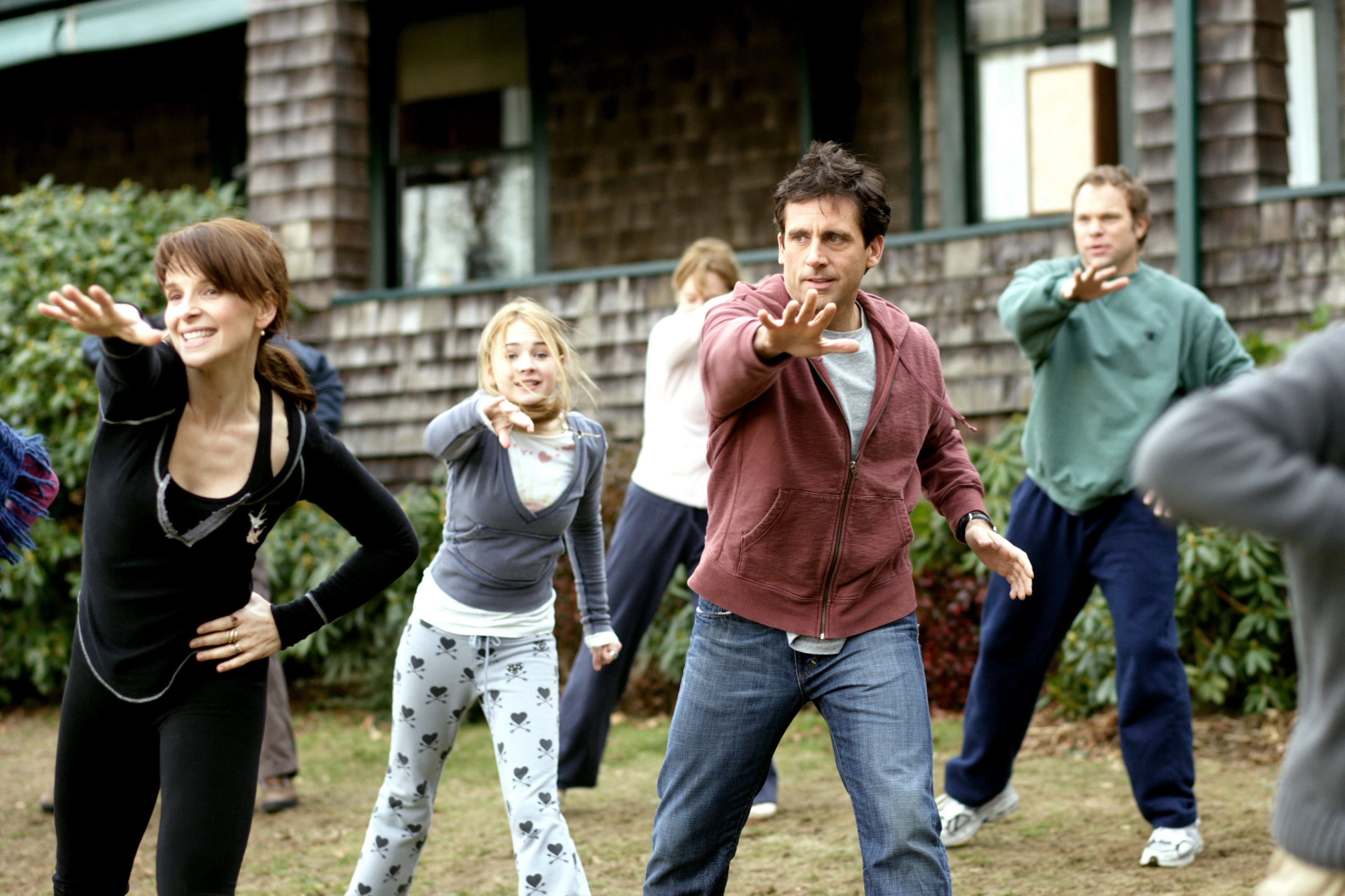 Juliette Binoche Alison Pill, and Steve Carell dance in the lawn with the family