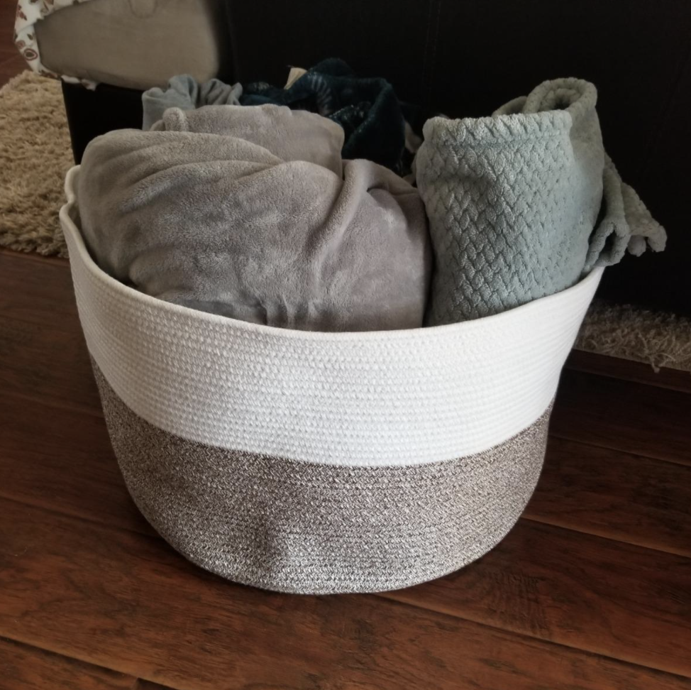 A reviewer&#x27;s blankets in the basket