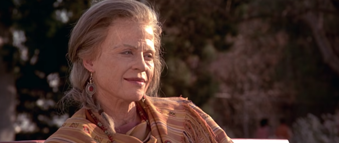 Sarah Connor as an older woman, with long grey hair, and a wrap around her shoulders