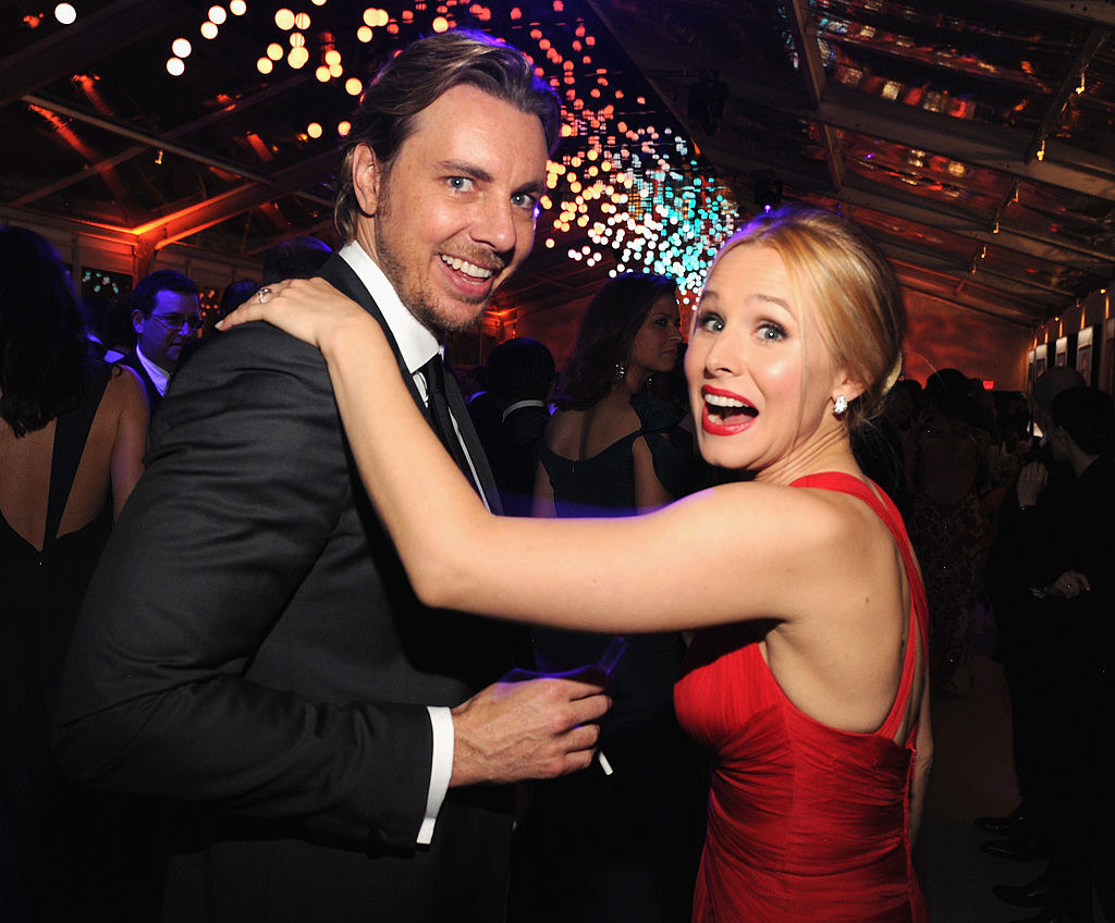 Dax Shepard (L) and Kristen Bell smiling at the 2014 Vanity Fair Oscar Party