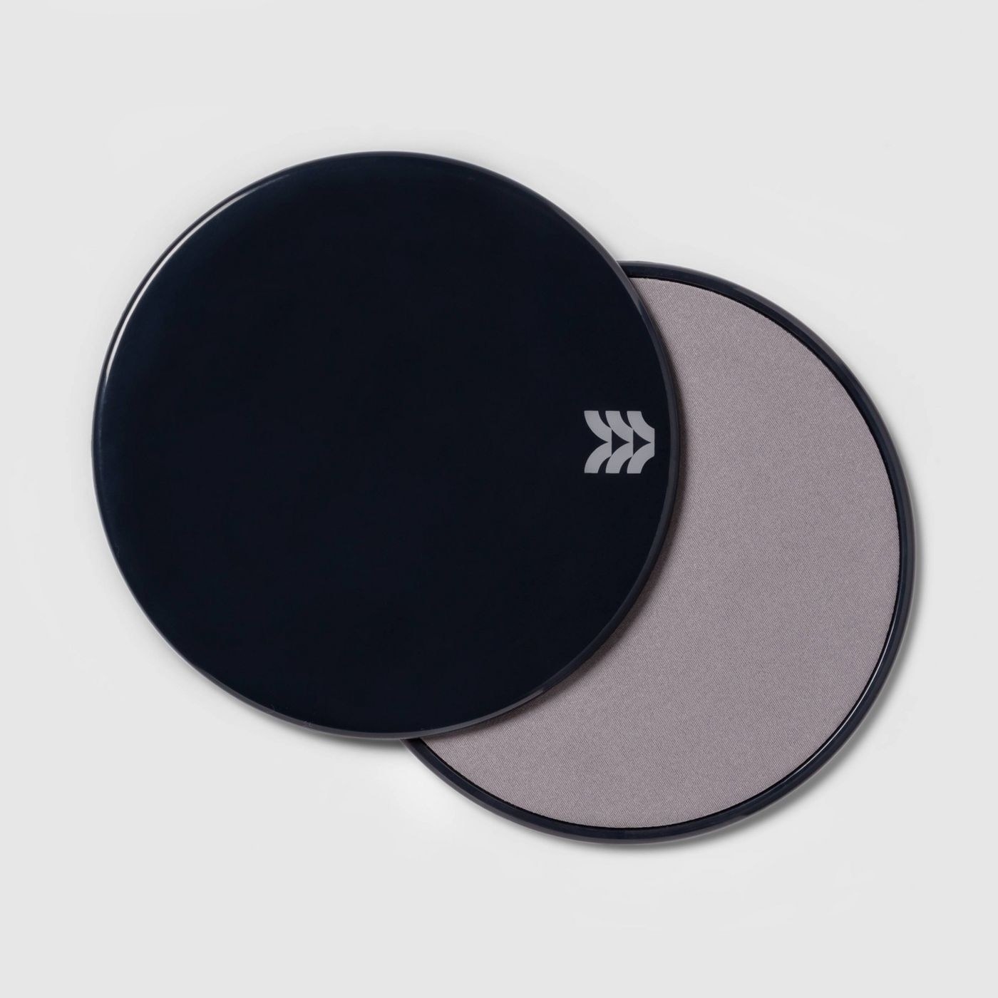 Navy sliding core discs with gray undersides.
