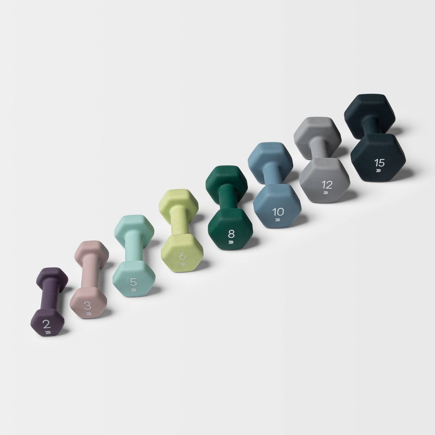 Dumbbells ranging in colors and weights, from 2 pounds to 15 pounds