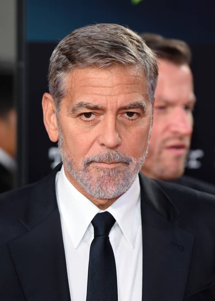 Clooney looks at the camera at an event