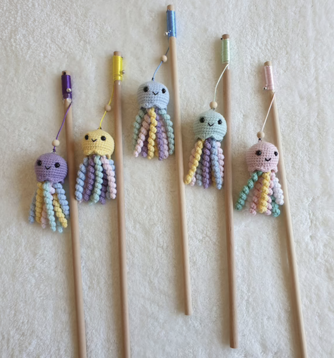 Woven octopus toys on sticks