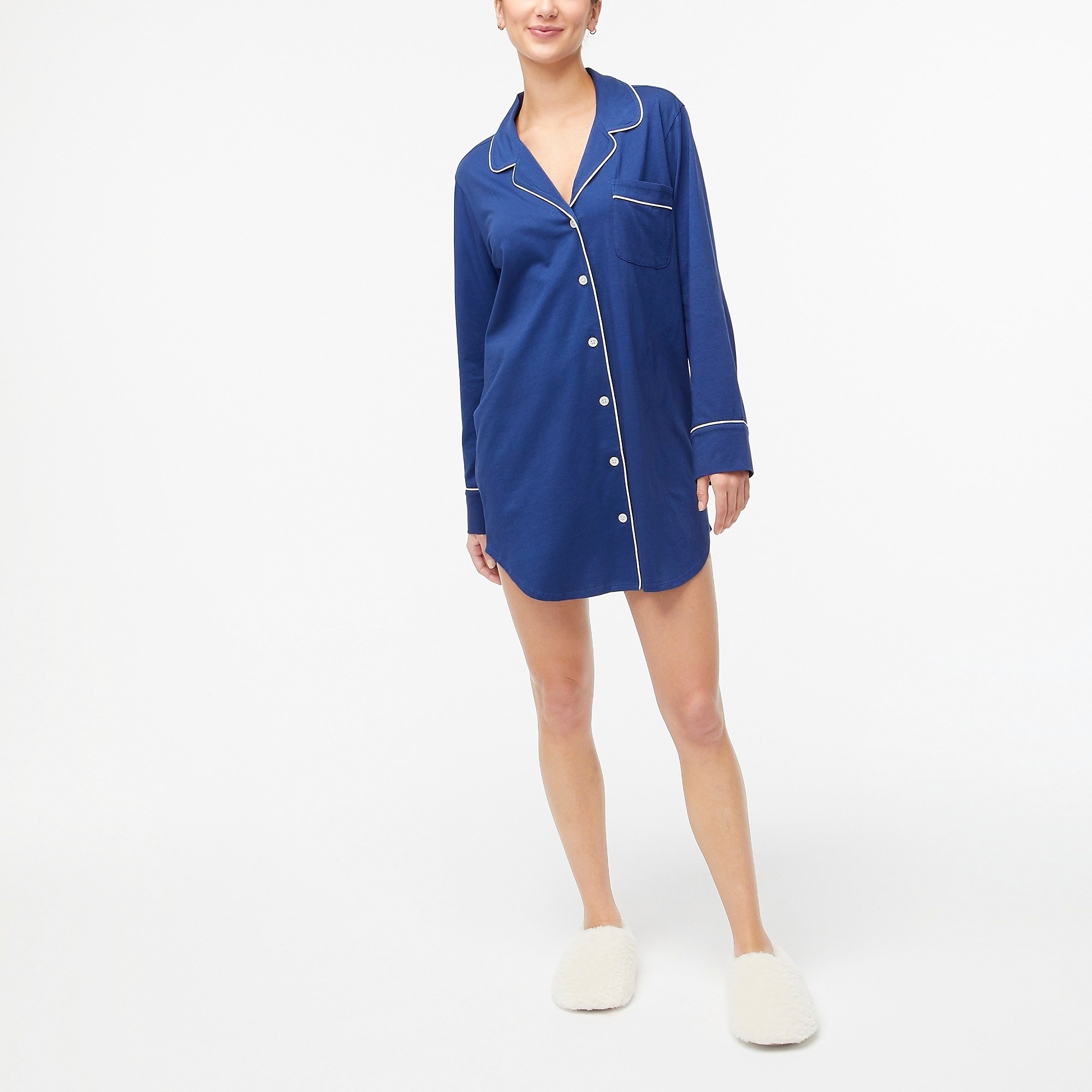 Model wearing a blue button-down nightgown with buttons