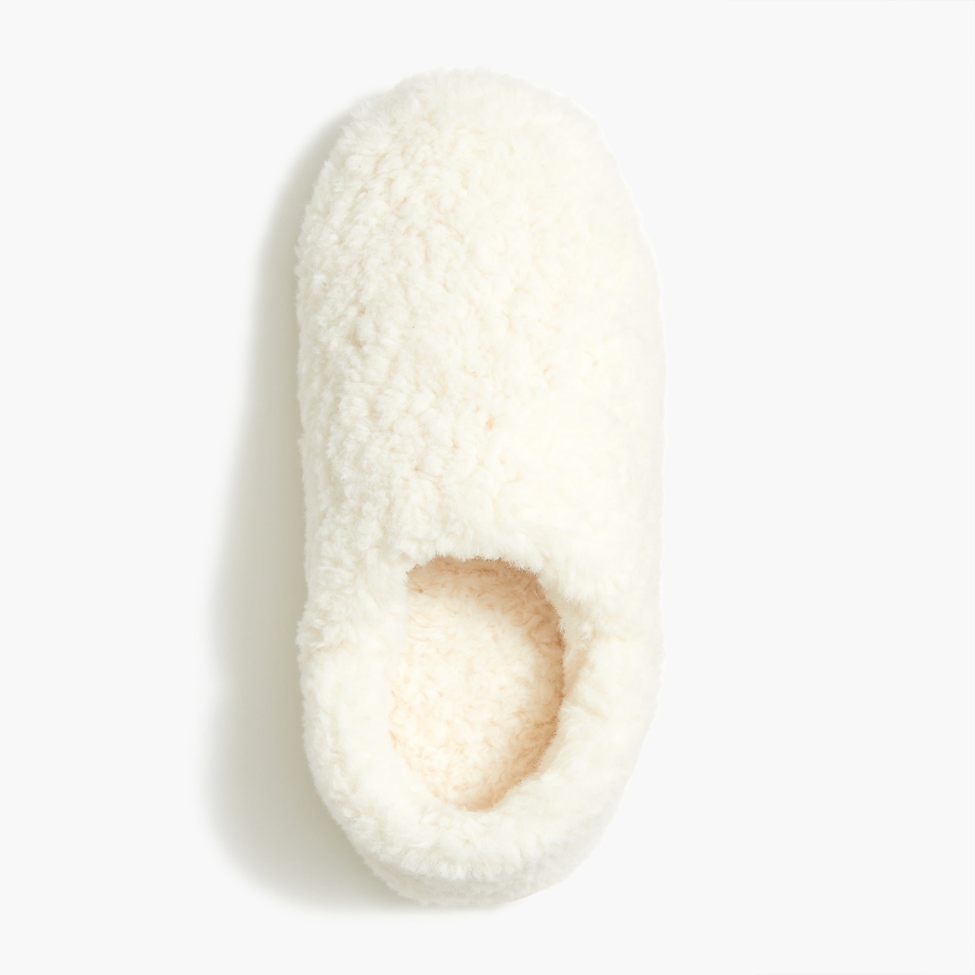A white fuzzy slipper
