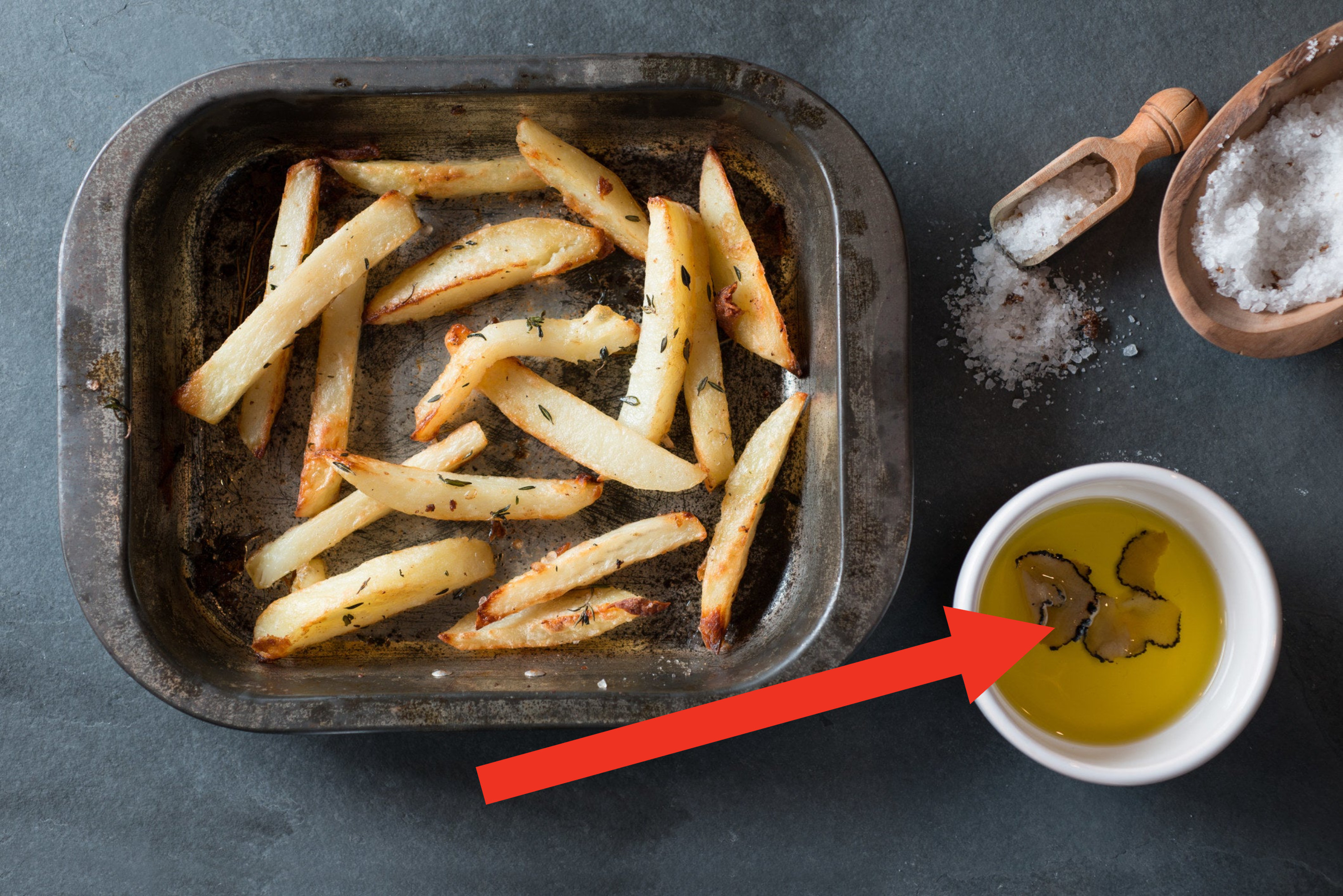 French fries with truffle oil on the side.