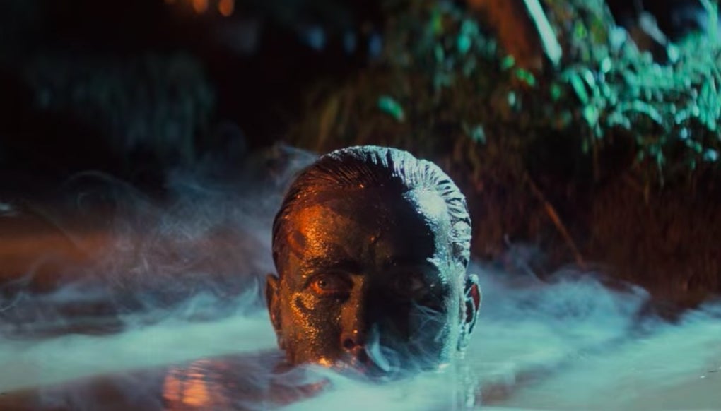 Willard rising out of the river with mud on his face in &quot;Apocalypse Now Redux&quot;