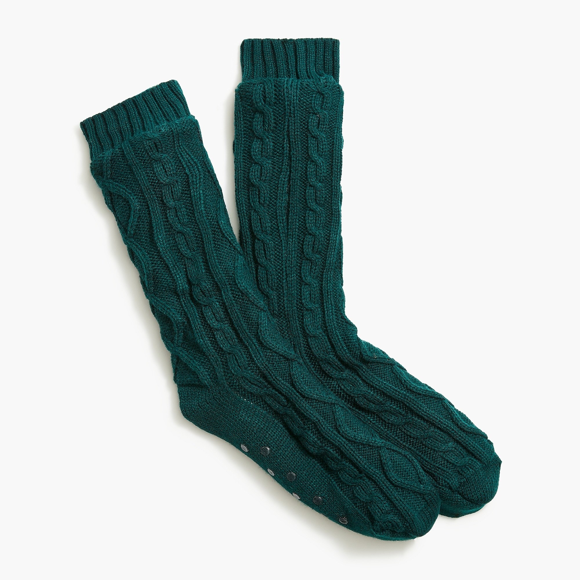 A pair of green cable knit trouser socks