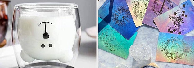 to the left: a mug with an upside down bear in it, to the right: pretty tarot cards
