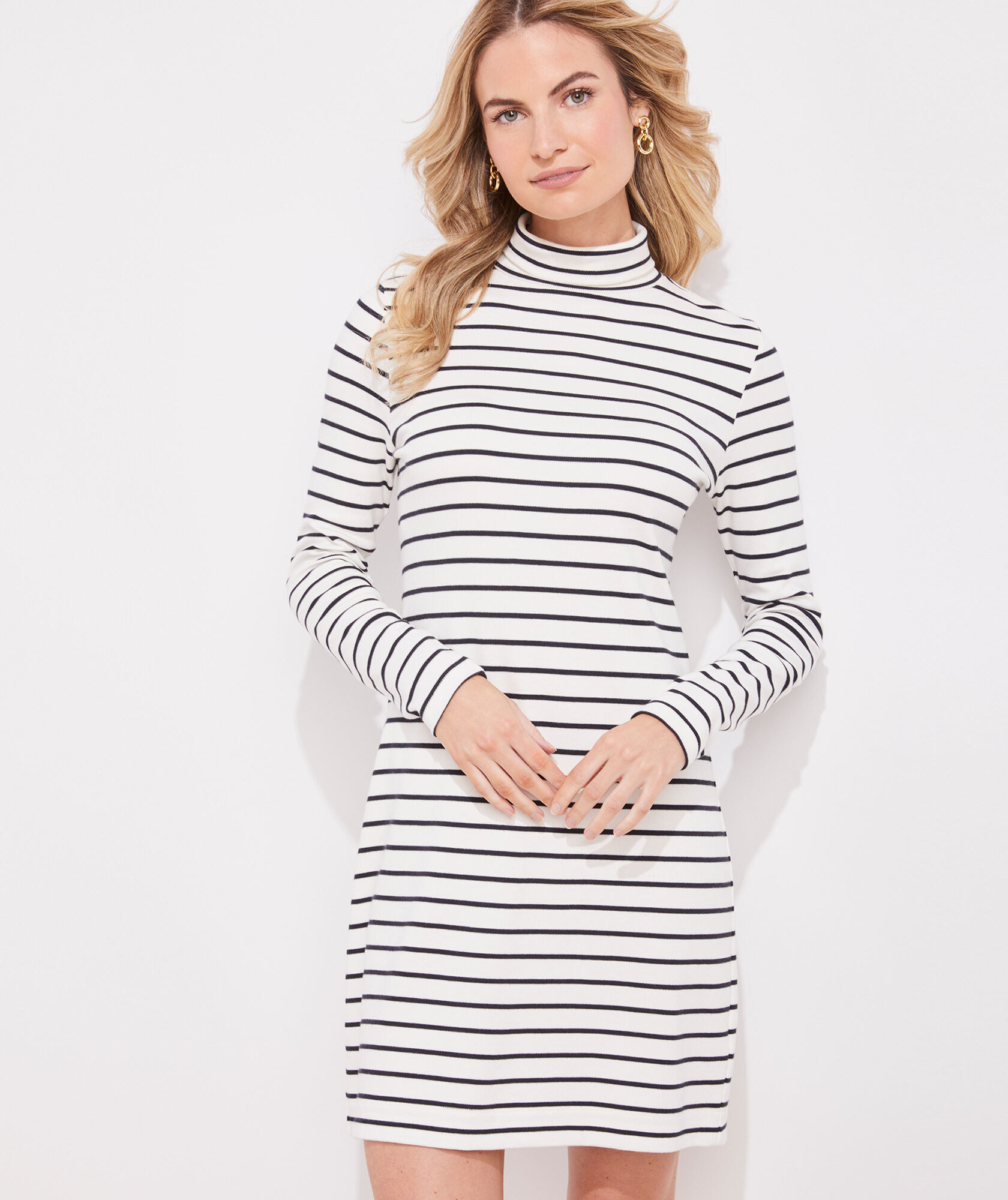 Model wearing striped Vineyard Vines turtleneck dress